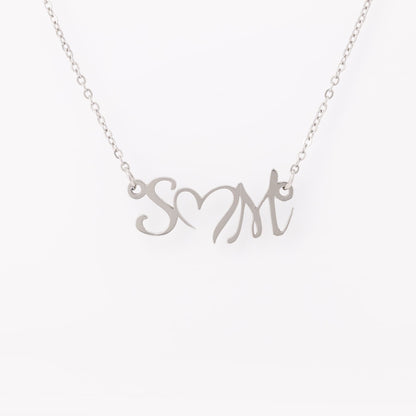 DOUBLE INITIAL HEART NECKLACE
