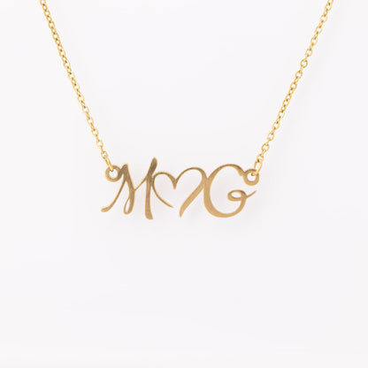 DOUBLE INITIAL HEART NECKLACE