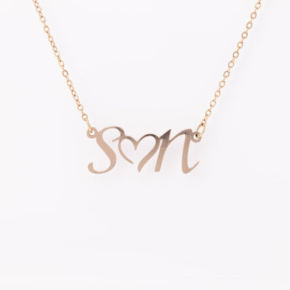DOUBLE INITIAL HEART NECKLACE
